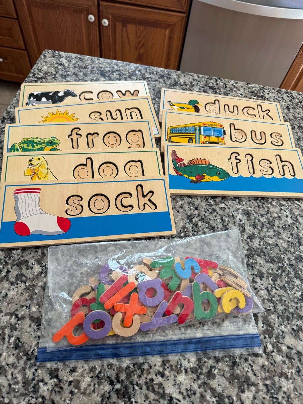 Melissa & Doug Wooden Word Puzzle Set with Red, Blue, Green, Yellow Accents